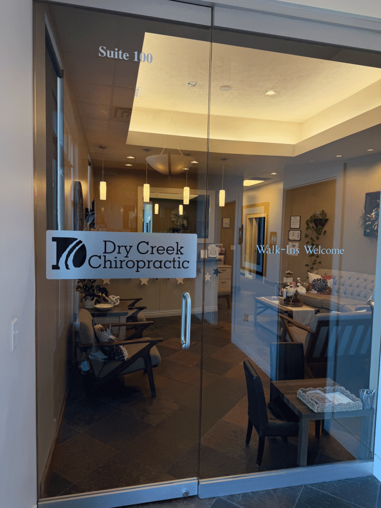 Front entrance with glass doors to the Dry Creek Chiropractic office in Lehi Utah